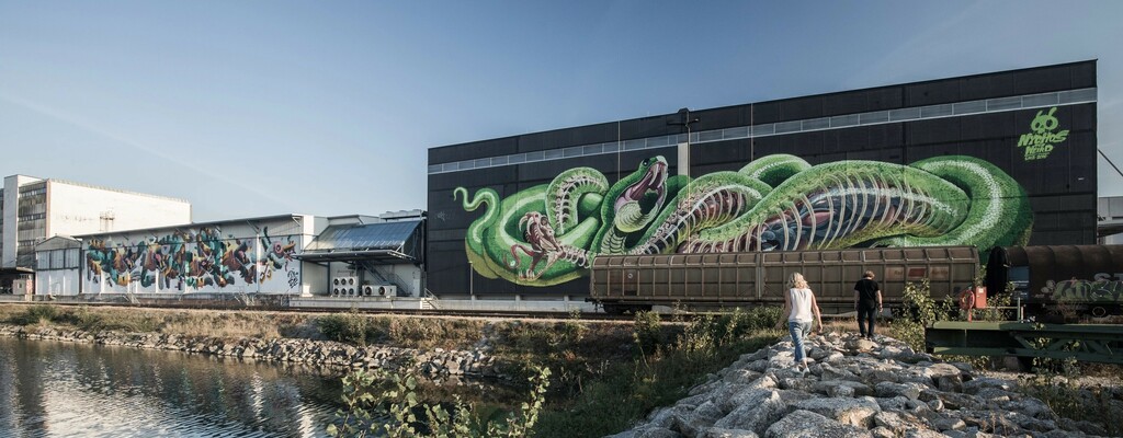 Freiluftgalerie Mural Harbor mit Graffitikunst von Nychos